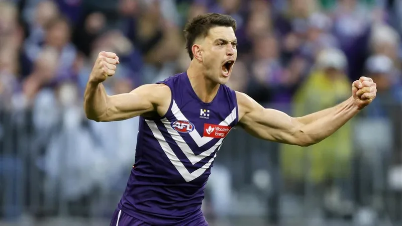 Petty act: Pat Voss cops AFL fine for cry baby gesture