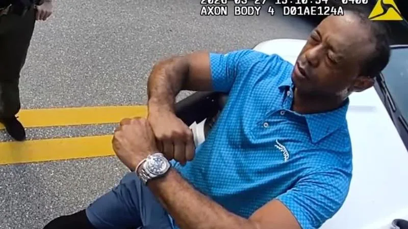 Tiger Woods' arrest: Police body and car-cam footage show golf star in shock after Florida car crash