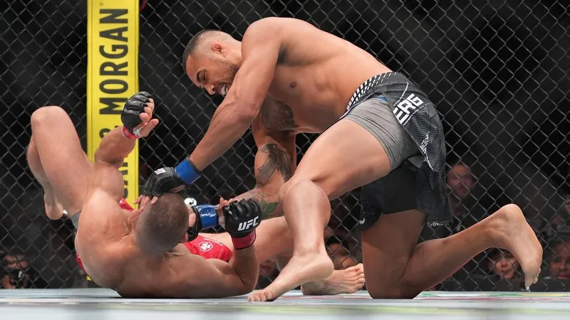 Hobbling Kiwi claims UFC belt with knockout blow