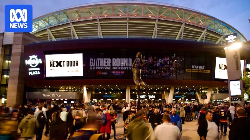 Record crowd for AFL Gather Round as SA premier warns of 'lite' interstate version