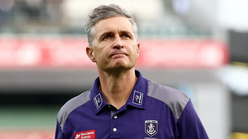 Western Derby 62: West Coast Eagles banner takes jab at Fremantle Dockers coach Justin Longmuir
