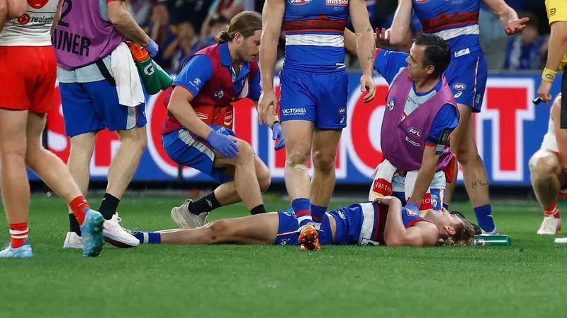 Western Bulldogs star Aaron Naughton escapes serious injury after landing on neck against Sydney Swans