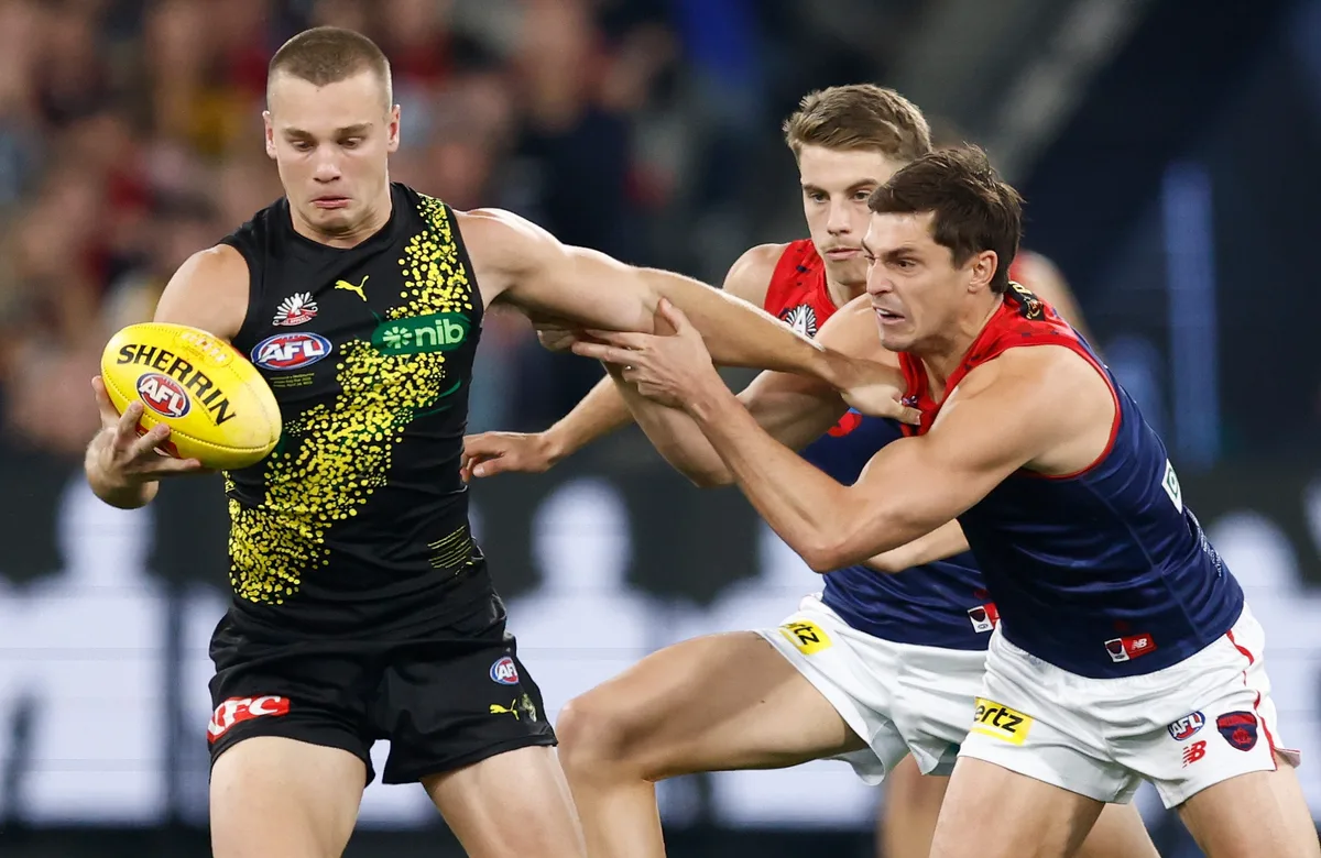 Winless Tigers swing late change for Dees clash. LIVE from 7.40pm AEST