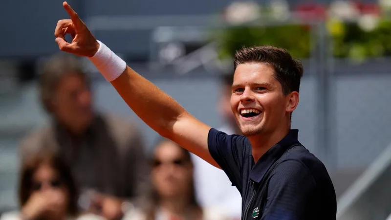 Ruud shock as Belgian youngster knocks out Madrid champ
