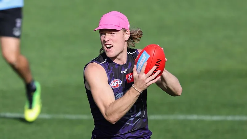 Fremantle star Hayden Young closing in on AFL return as Dockers provide positive update on key trio